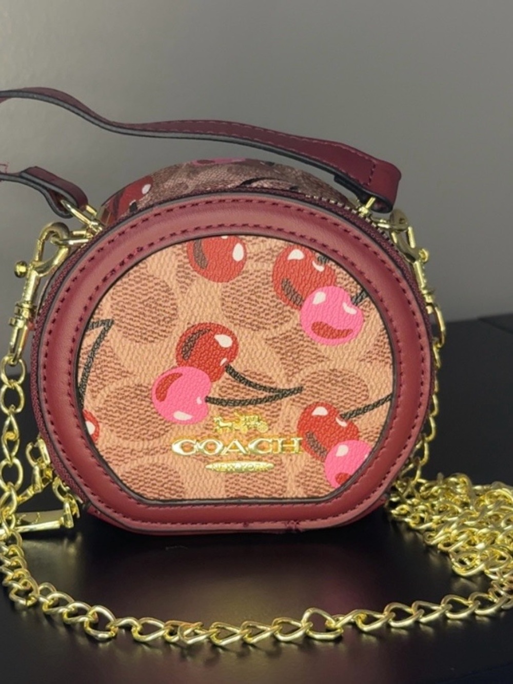 Coach Cherry Print Round Crossbody in Red and Pink